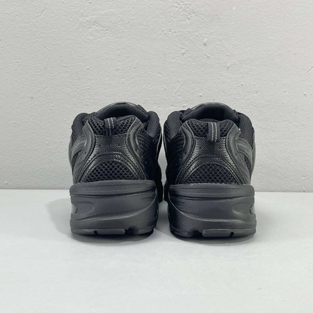 New Balance 530 Black Low-Top Sneakers with Silver Accents