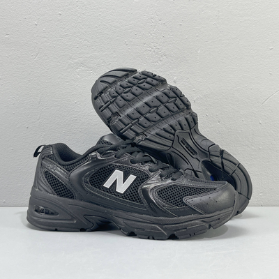 New Balance 530 Black Low-Top Sneakers with Silver Accents